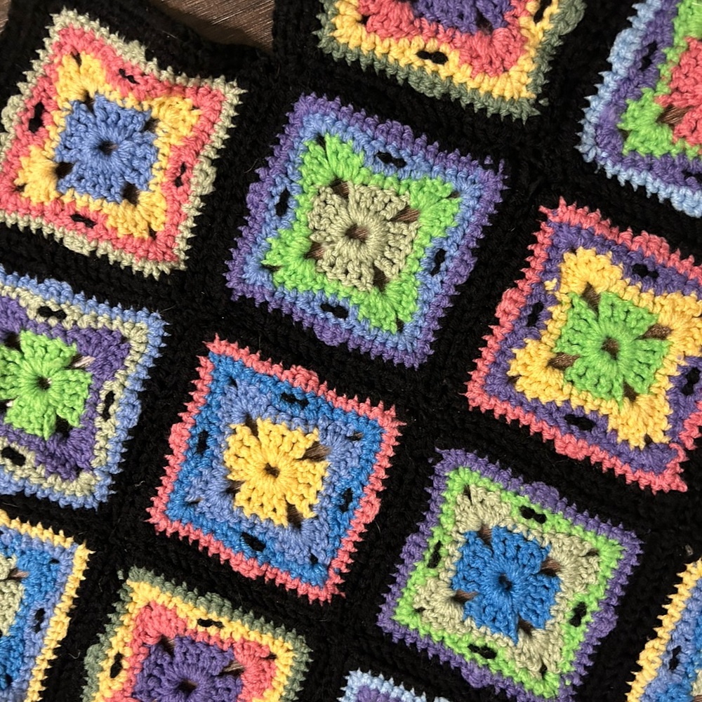 Crocheted throw blanket multi-colored